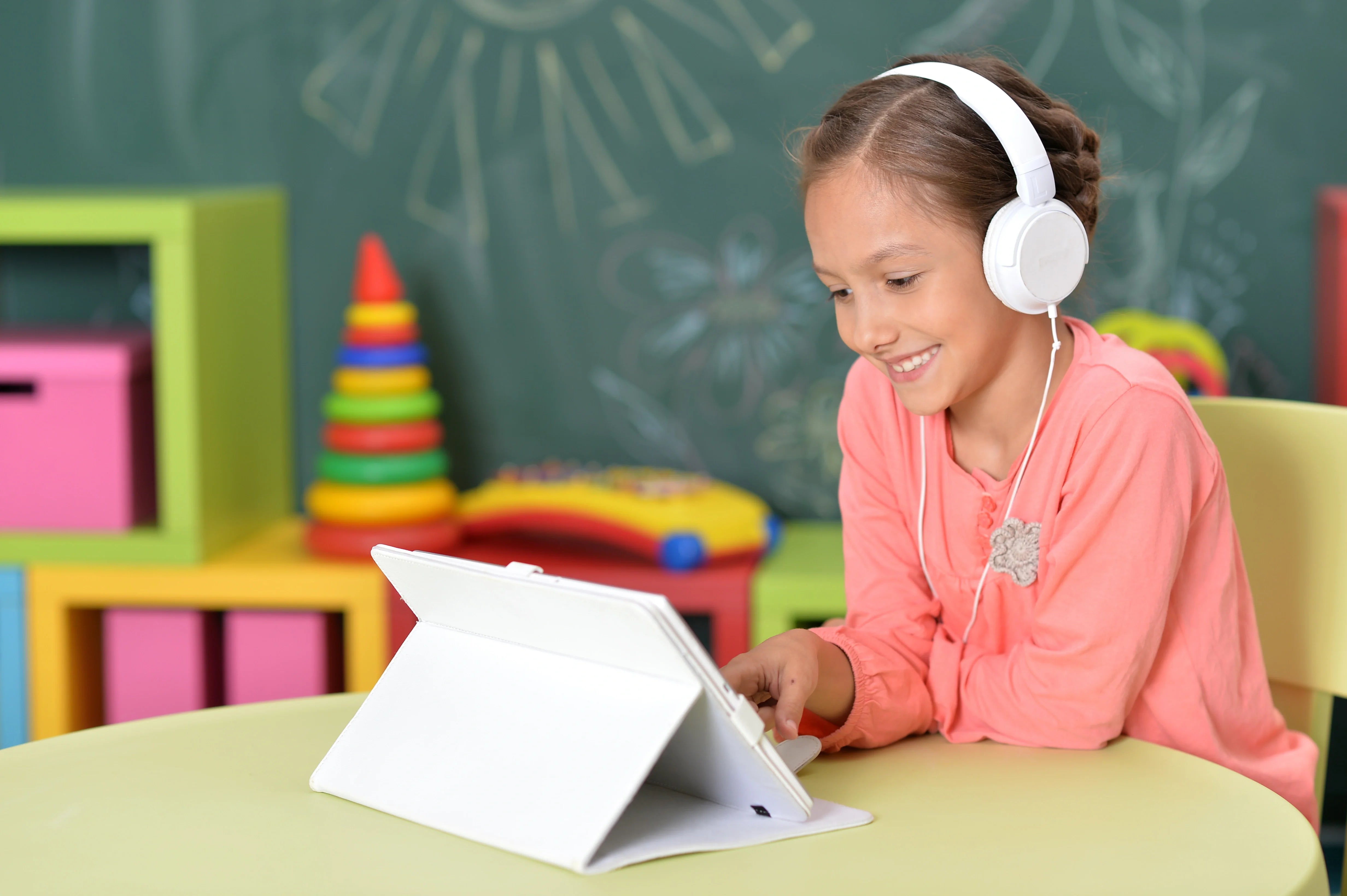 Family, Fun & Gaming. Girl playing on ipad